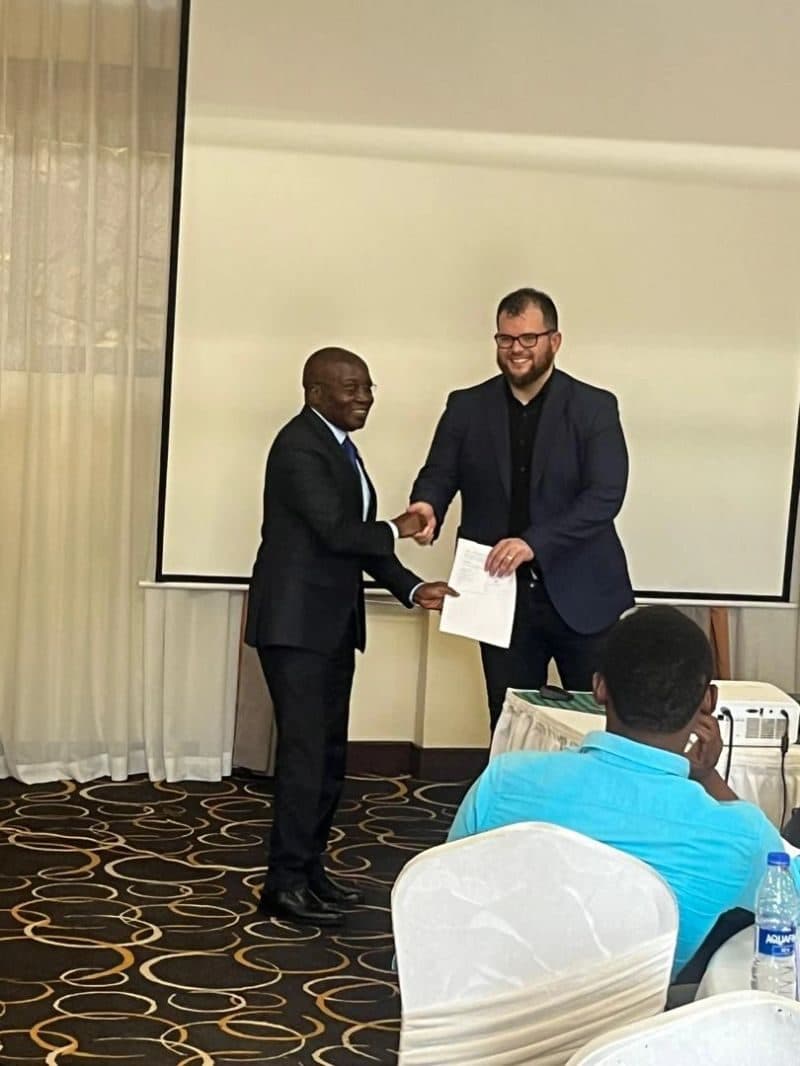 Carlos Parker of Arxia with a member of the Uganda Vice-Chancellors Forum